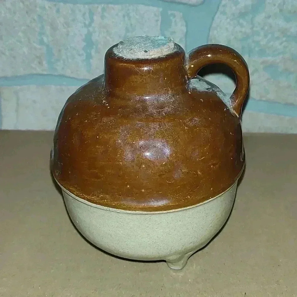 Vintage 4-in acorn footed salt glazed jug